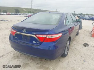 2016 Toyota Camry Hybrid LE with VIN 4T1BD1FK1GU199442, listed as a IAAI auction lot 41755284 with 137,239 mi miles. Bid and sale history available at carsss.com. Image 4.
