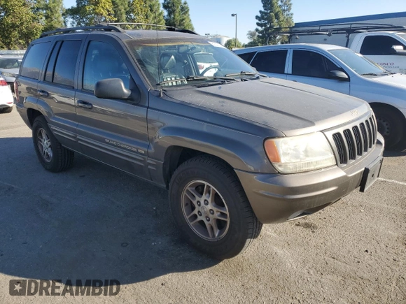 1999 Jeep Grand Cherokee Limited with VIN 1J4G268SXXC759016, listed as a Copart auction lot 80307534 with 215,870 mi miles and Salvage title. Bid and sale history available at DreamBid. Image 4.