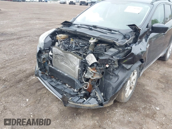 2015 Ford Escape SE with VIN 1FMCU9GX5FUB99018, listed as a IAAI auction lot 42250840 with 126,850 mi miles and . Bid and sale history available at DreamBid. Image 6.
