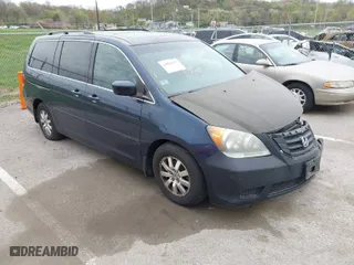 2009 Honda Odyssey EX-L with VIN 5FNRL38769B409281, listed as a IAAI auction lot 42013137 with 213,934 mi miles. Bid and sale history available at carsss.com. Image 1.