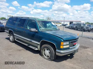1997 GMC Suburban with VIN 1GKFK16R6VJ706590, listed as a IAAI auction lot 42194855 with 155,680 mi miles and . Bid and sale history available at DreamBid. Image 1.