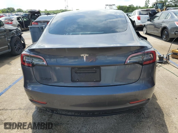 2023 Tesla Model 3 with VIN 5YJ3E1EA4PF614129, listed as a Copart auction lot 62019385 with 23,218 mi miles and Salvage title. Bid and sale history available at DreamBid. Image 6.