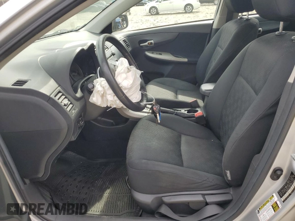 2010 Toyota Corolla with VIN 2T1BU4EEXAC457317, listed as a Copart auction lot 51596195 with 203,296 mi miles and Salvage Title. Bid and sale history available at carsss.com. Image 7.