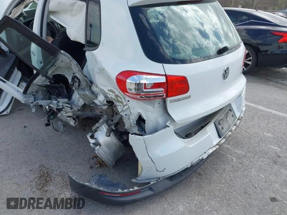 2016 Volkswagen Tiguan S with VIN WVGBV7AX5GW600479, listed as a IAAI auction lot 41828028 with 131,910 mi miles and . Bid and sale history available at DreamBid. Image 6.