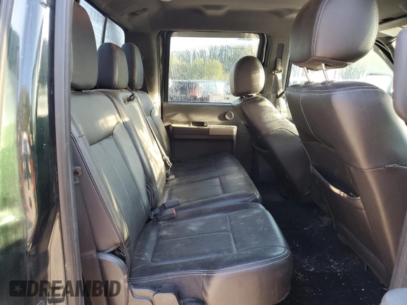 2012 Ford F-350 XL with VIN 1FT8W3B67CEC66479, listed as a Copart auction lot 74112284 with 64,711 mi miles and Salvage title. Bid and sale history available at DreamBid. Image 11.
