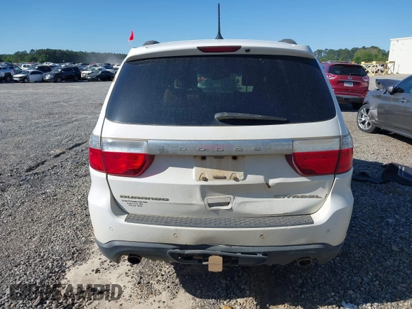 2013 Dodge Durango Citadel with VIN 1C4SDHET0DC571961, listed as a IAAI auction lot 42050261 with 257,637 mi miles and . Bid and sale history available at DreamBid. Image 6.