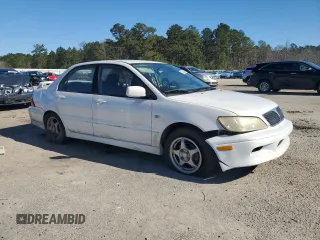 2002 Mitsubishi Lancer OZ-Rally with VIN JA3AJ86E32U003276, listed as a Copart auction lot 80536704 with 227,684 mi miles and Salvage Title. Bid and sale history available at carsss.com. Image 4.
