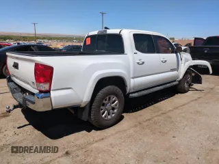 2017 Toyota Tacoma SR5 z VIN 5TFAZ5CN5HX048708, wystawiony jako Copart lot #53750475 z przebiegiem 104 861 mil mil oraz Szkody całkowita. Historia ofert i sprzedaży dostępna na DreamBid. Obrazek 3.