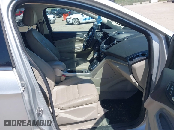 2013 Ford Escape SEL with VIN 1FMCU9H91DUA14749, listed as a IAAI auction lot 42039685 with 186,669 mi miles. Bid and sale history available at carsss.com. Image 5.