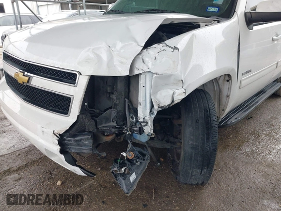 2013 Chevrolet Tahoe LS with VIN 1GNSCAE05DR276326, listed as a IAAI auction lot 41894489 with 173,183 mi miles and . Bid and sale history available at DreamBid. Image 6.