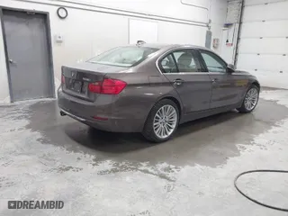 2014 BMW 3 Series 328i xDrive with VIN WBA3B3C58EJ980821, listed as a IAAI auction lot 41632452 with 59,801 mi miles. Bid and sale history available at carsss.com. Image 4.