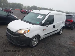 2017 Ram ProMaster City Cargo Tradesman z VIN ZFBERFAB2H6E50911, wystawiony jako IAAI lot #40390843 z przebiegiem 68 010 mil mil oraz . Historia ofert i sprzedaży dostępna na DreamBid. Obrazek 2.