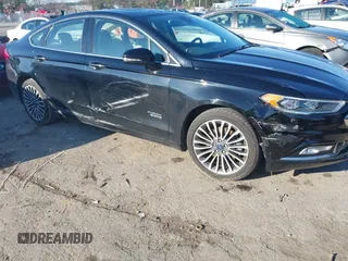 2017 Ford Fusion Titanium with VIN 3FA6P0SU2HR309895, listed as a IAAI auction lot 40963527 with 80,761 mi miles and . Bid and sale history available at DreamBid. Image 6.