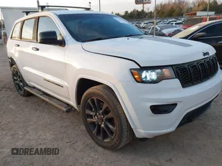 2021 Jeep Grand Cherokee Laredo E with VIN 1C4RJFAG2MC730015, listed as a IAAI auction lot 41193614 with 40,773 mi miles and . Bid and sale history available at DreamBid. Image 1.