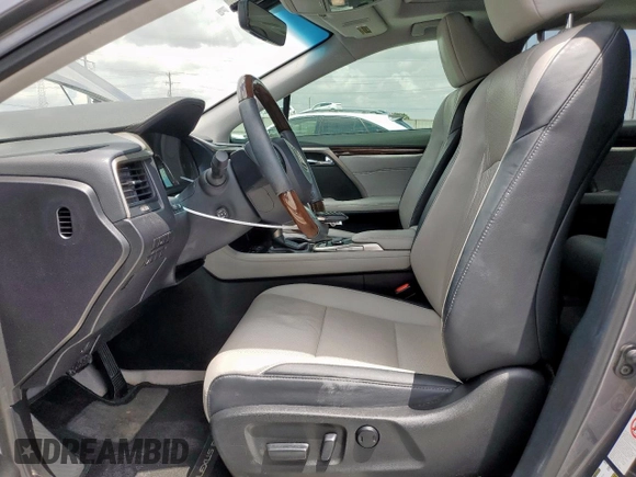 2016 Lexus RX 350 with VIN 2T2BZMCA4GC032889, listed as a Copart auction lot 62351685 with 114,556 mi miles and Salvage title. Bid and sale history available at DreamBid. Image 7.