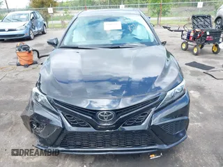 2023 Toyota Camry SE with VIN 4T1G11AK6PU829509, listed as a IAAI auction lot 42009085 with 35,864 mi miles and . Bid and sale history available at DreamBid. Image 12.