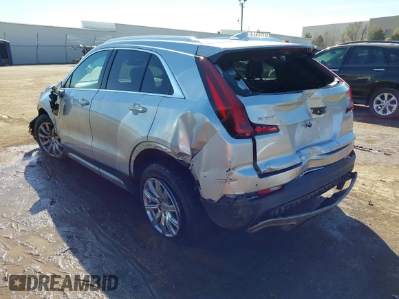 2019 Cadillac XT4 FWD Premium Luxury with VIN 1GYFZCR47KF110481, listed as a IAAI auction lot 41771338 with 103,124 mi miles. Bid and sale history available at carsss.com. Image 3.