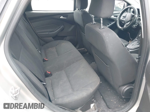 2016 Ford Focus SE z VIN 1FADP3F26GL368544, wystawiony jako IAAI lot #42322376 z przebiegiem 120 535 mil mil oraz . Historia ofert i sprzedaży dostępna na DreamBid. Obrazek 8.