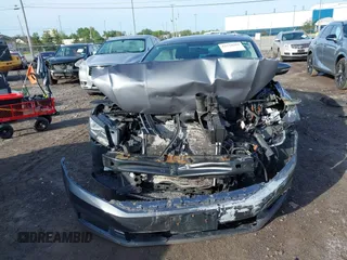 2016 Volkswagen Passat SE z VIN 1VWBT7A32GC016577, wystawiony jako IAAI lot #42334269 z przebiegiem 128 006 mil mil oraz . Historia ofert i sprzedaży dostępna na DreamBid. Obrazek 12.