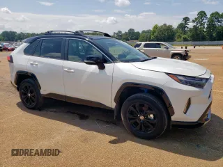 2023 Toyota RAV4 Hybrid XSE with VIN 2T3E6RFV5PW043640, listed as a Copart auction lot 64097125 with 13,686 mi miles and Salvage title. Bid and sale history available at DreamBid. Image 4.