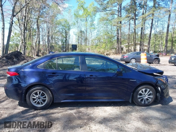 2021 Toyota Corolla Hybrid LE with VIN JTDEAMDE9MJ008582, listed as a IAAI auction lot 41998098 with 113,863 mi miles. Bid and sale history available at carsss.com. Image 12.