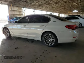 2018 BMW 5 Series 530e with VIN WBAJA9C53JG622997, listed as a Copart auction lot 79959024 with 127,486 mi miles and Salvage title. Bid and sale history available at DreamBid. Image 2.