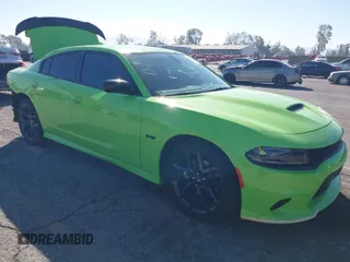2023 Dodge Charger R/T with VIN 2C3CDXCT5PH584776, listed as a IAAI auction lot 41667014 with 14,730 mi miles and . Bid and sale history available at carsss.com. Image 1.