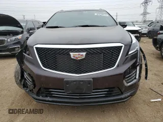 2021 Cadillac XT5 AWD Sport with VIN 1GYKNGRS2MZ142286, listed as a Copart auction lot 60699515 with 17,406 mi miles and Salvage title. Bid and sale history available at DreamBid. Image 5.