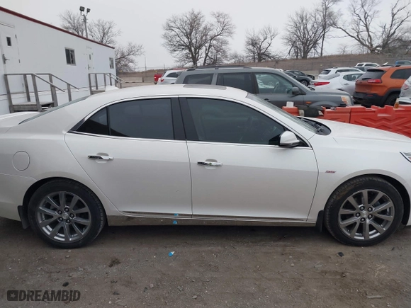 2013 Chevrolet Malibu LTZ with VIN 1G11H5SA7DF127467, listed as a IAAI auction lot 41192477 with 138,344 mi miles. Bid and sale history available at carsss.com. Image 13.