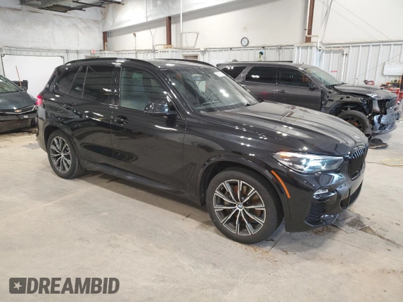 2021 BMW X5 xDrive45e with VIN 5UXTA6C02M9F45757, listed as a Copart auction lot 61991985 with 65,162 mi miles and Salvage title. Bid and sale history available at DreamBid. Image 4.