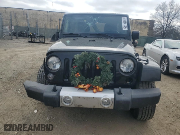 2015 Jeep Wrangler Unlimited Sahara with VIN 1C4BJWEG3FL530114, listed as a Copart auction lot 49444135 with 156,669 mi miles and Salvage Title. Bid and sale history available at carsss.com. Image 5.