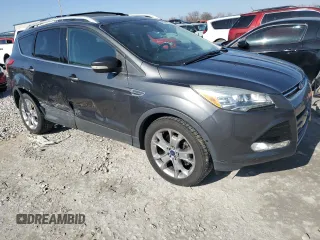 2016 Ford Escape Titanium with VIN 1FMCU9J97GUC18874, listed as a Copart auction lot 48399245 with 138,133 mi miles and Salvage Title. Bid and sale history available at DreamBid. Image 4.