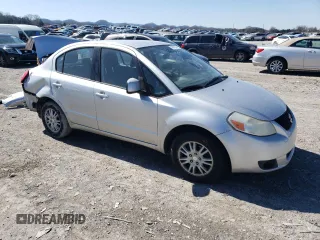 2012 Suzuki SX4 LE with VIN JS2YC5A38C6305396, listed as a Copart auction lot 49915025 with Not Provided miles and Clean Title. Bid and sale history available at carsss.com. Image 4.
