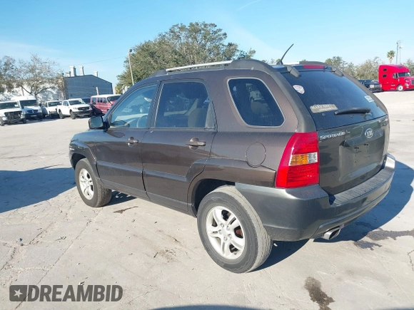 2005 Kia Sportage LX z VIN KNDJF723757132772, wystawiony jako IAAI lot #41436925 z przebiegiem 134 653 mil mil oraz . Historia ofert i sprzedaży dostępna na DreamBid. Obrazek 3.