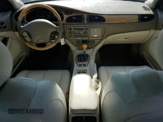 2002 Jaguar S-Type with VIN SAJDA01P52GM27504, listed as a Copart auction lot 57850944 with 119,707 mi miles and Clean Title. Bid and sale history available at DreamBid. Image 8.