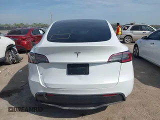 2025 Tesla Model Y Long Range z VIN 7SAYGDED7SA373784, wystawiony jako IAAI lot #41881719 z przebiegiem 1 192 mil mil oraz . Historia ofert i sprzedaży dostępna na DreamBid. Obrazek 16.