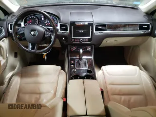 2013 Volkswagen Touareg Lux with VIN WVGEF9BP6DD002607, listed as a Copart auction lot 83420704 with 143,571 mi miles and Salvage Title. Bid and sale history available at DreamBid. Image 8.