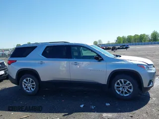 2018 Chevrolet Traverse LT Cloth z VIN 1GNERGKW5JJ188930, wystawiony jako IAAI lot #41976328 z przebiegiem 166 472 mil mil oraz . Historia ofert i sprzedaży dostępna na DreamBid. Obrazek 13.