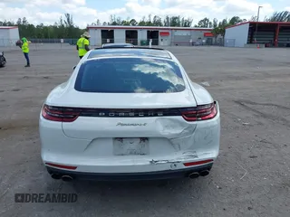 2018 Porsche Panamera 4 E-Hybrid with VIN WP0AE2A74JL130540, listed as a IAAI auction lot 42078444 with 65,981 mi miles and . Bid and sale history available at DreamBid. Image 16.