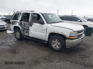 2004 Chevrolet Tahoe LS z VIN 1GNEC13Z94R265831, wystawiony jako IAAI lot #41840133 z przebiegiem 176 219 mil mil oraz . Historia ofert i sprzedaży dostępna na DreamBid. Obrazek 1.