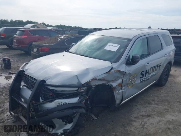2023 Dodge Durango Pursuit with VIN 1C4SDJFT5PC629959, listed as a IAAI auction lot 40274866 with 6,877 mi miles and . Bid and sale history available at DreamBid. Image 17.