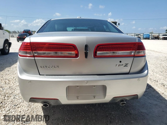 2012 Lincoln MKZ z VIN 3LNHL2GC4CR800578, wystawiony jako Copart lot #58409215 z przebiegiem 49 423 mil mil oraz Szkoda całkowita • Salvage title. Historia ofert i sprzedaży dostępna na DreamBid. Obrazek 6.