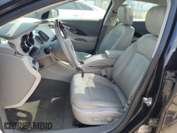 2012 Buick LaCrosse Touring with VIN 1G4GJ5E30CF345103, listed as a Copart auction lot 57356625 with 137,808 mi miles and Clean title. Bid and sale history available at DreamBid. Image 7.