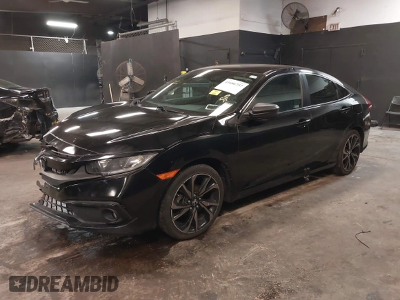 2019 Honda Civic Sport with VIN 2HGFC2F84KH590469, listed as a IAAI auction lot 41686757 with 79,602 mi miles and . Bid and sale history available at DreamBid. Image 18.