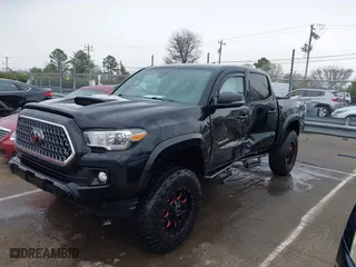2019 Toyota Tacoma 4WD SR with VIN 3TMCZ5AN1KM247618, listed as a IAAI auction lot 41734570 with 68,796 mi miles. Bid and sale history available at carsss.com. Image 17.