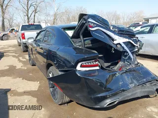2019 Dodge Charger SXT with VIN 2C3CDXBG9KH580890, listed as a IAAI auction lot 41793008 with 52,497 mi miles. Bid and sale history available at carsss.com. Image 3.