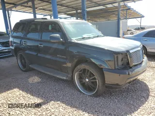 2002 Cadillac Escalade z VIN 1GYEK63N82R329743, wystawiony jako Copart lot #56587295 z przebiegiem 215 694 mil mil oraz Szkoda całkowita • Salvage title. Historia ofert i sprzedaży dostępna na DreamBid. Obrazek 4.
