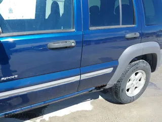 2003 Jeep Liberty Sport with VIN 1J4GL48K73W580572, listed as a IAAI auction lot 41846727 with 183,553 mi miles. Bid and sale history available at carsss.com. Image 12.