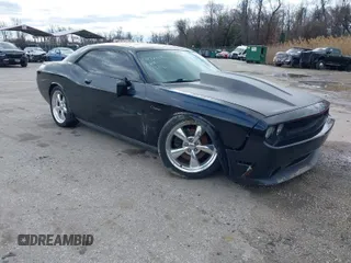 2013 Dodge Challenger R/T z VIN 2C3CDYBT8DH531203, wystawiony jako IAAI lot #41721895 z przebiegiem 92 557 mil mil oraz . Historia ofert i sprzedaży dostępna na DreamBid. Obrazek 1.