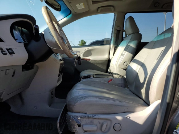 2012 Toyota Sienna XLE AAS with VIN 5TDYK3DC1CS279575, listed as a Copart auction lot 60350235 with 275,287 mi miles and Salvage title. Bid and sale history available at DreamBid. Image 7.